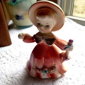 Pink lady porcelain figure